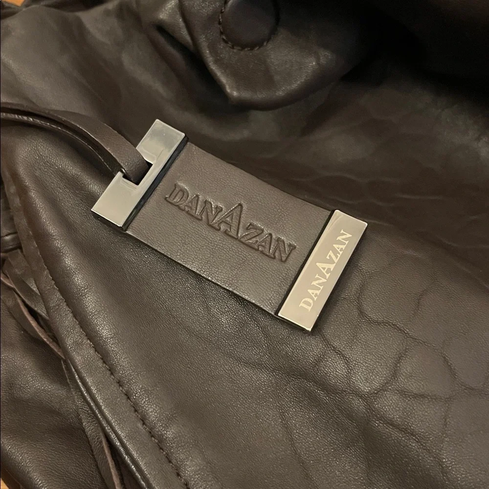 DanAzan slouchy one shoulder bag in brown leather with black adjustable strap